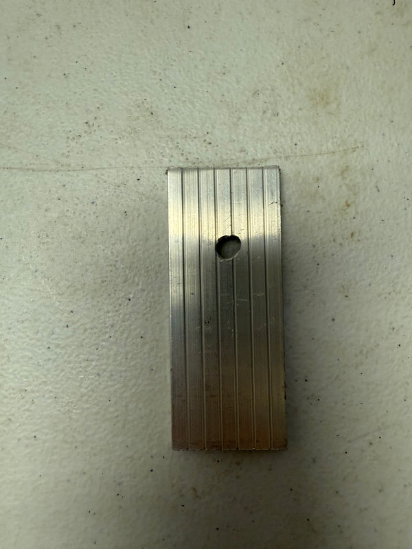 metal piece with hole