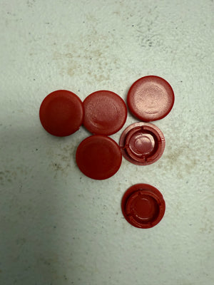 Red plastic button