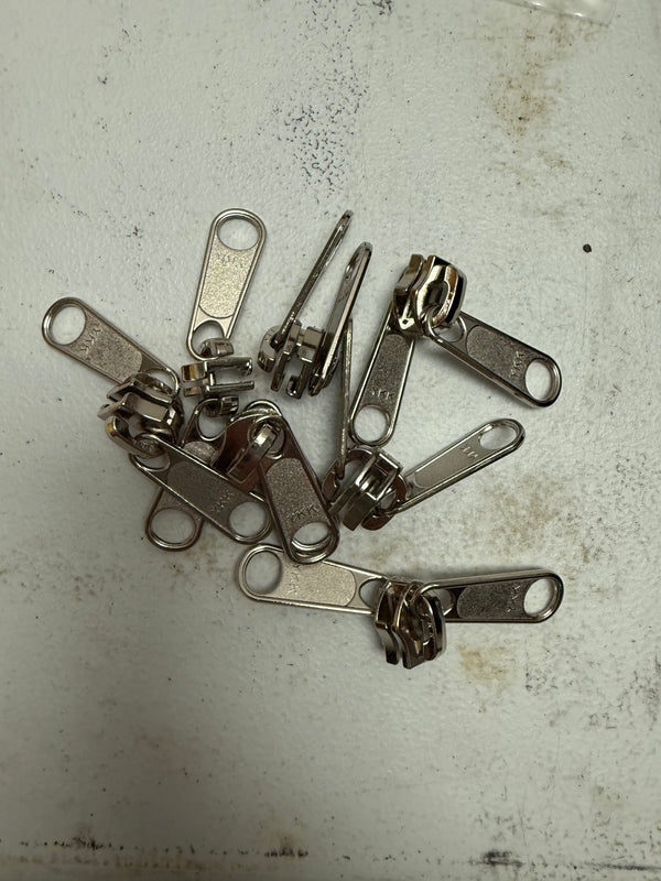 Zipper heads