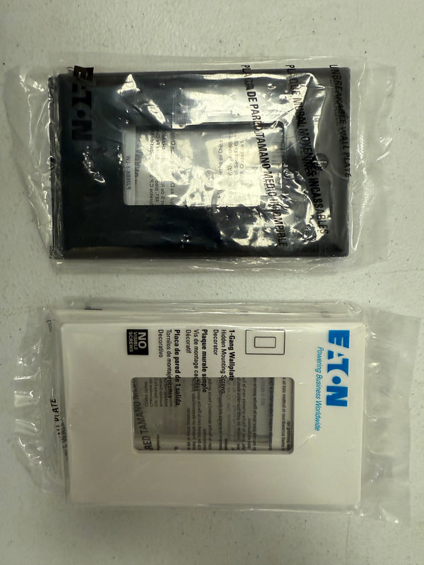Black and white outlet covers