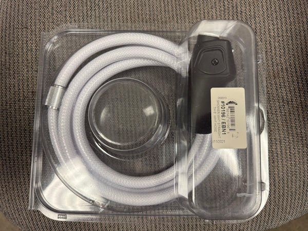 Shower-looking white hose w/ black connector